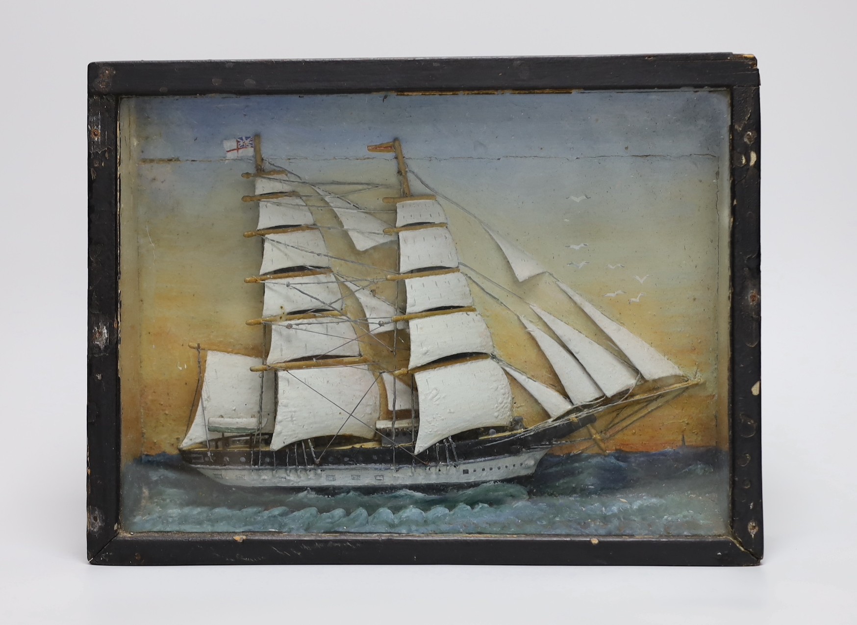 A painted half ship diorama, in glazed frame, 22x29cm
